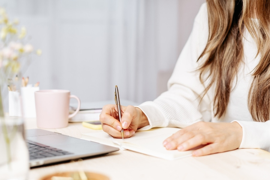 woman writing notes